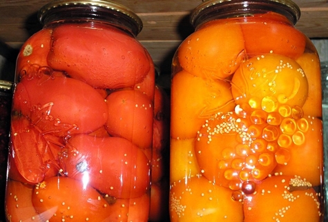 tomatoes with mustard seeds in a jar