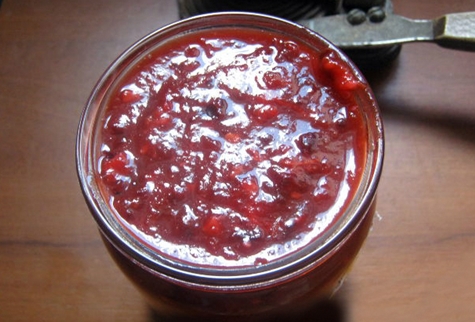 plum adjika in a jar