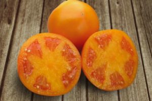 Beschrijving van de tomatenvariëteit Aisan en zijn kenmerken
