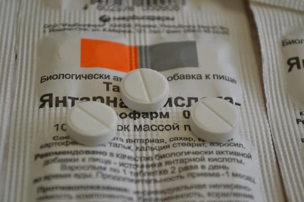 dzintarskābes tabletes