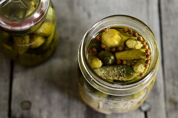 cucumbers in a jar with pepper