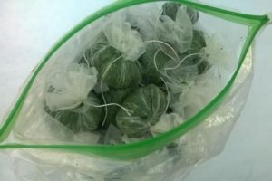 Rules for preparing arugula for the winter at home and tips for storing greens in the freezer and refrigerator