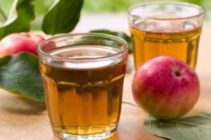 Simple recipes for making apple juice at home for the winter through a juicer