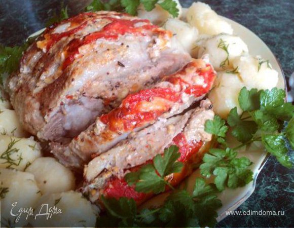 Pork baked with tomatoes