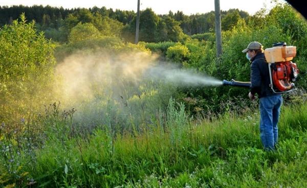Working with herbicide