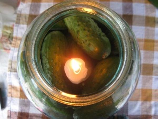 Cucumbers with a candle